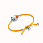 Orange cord bracelet with a pearl